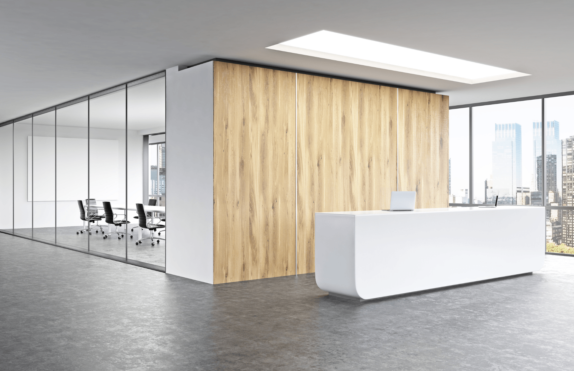 Modern office lobby with glass-walled meeting room, wood accent wall, and white reception desk