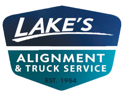 Lake's Alignment & Truck Service logo: white text on a blue and teal shield, "Lake's Alignment & Truck Service Est. 1954".