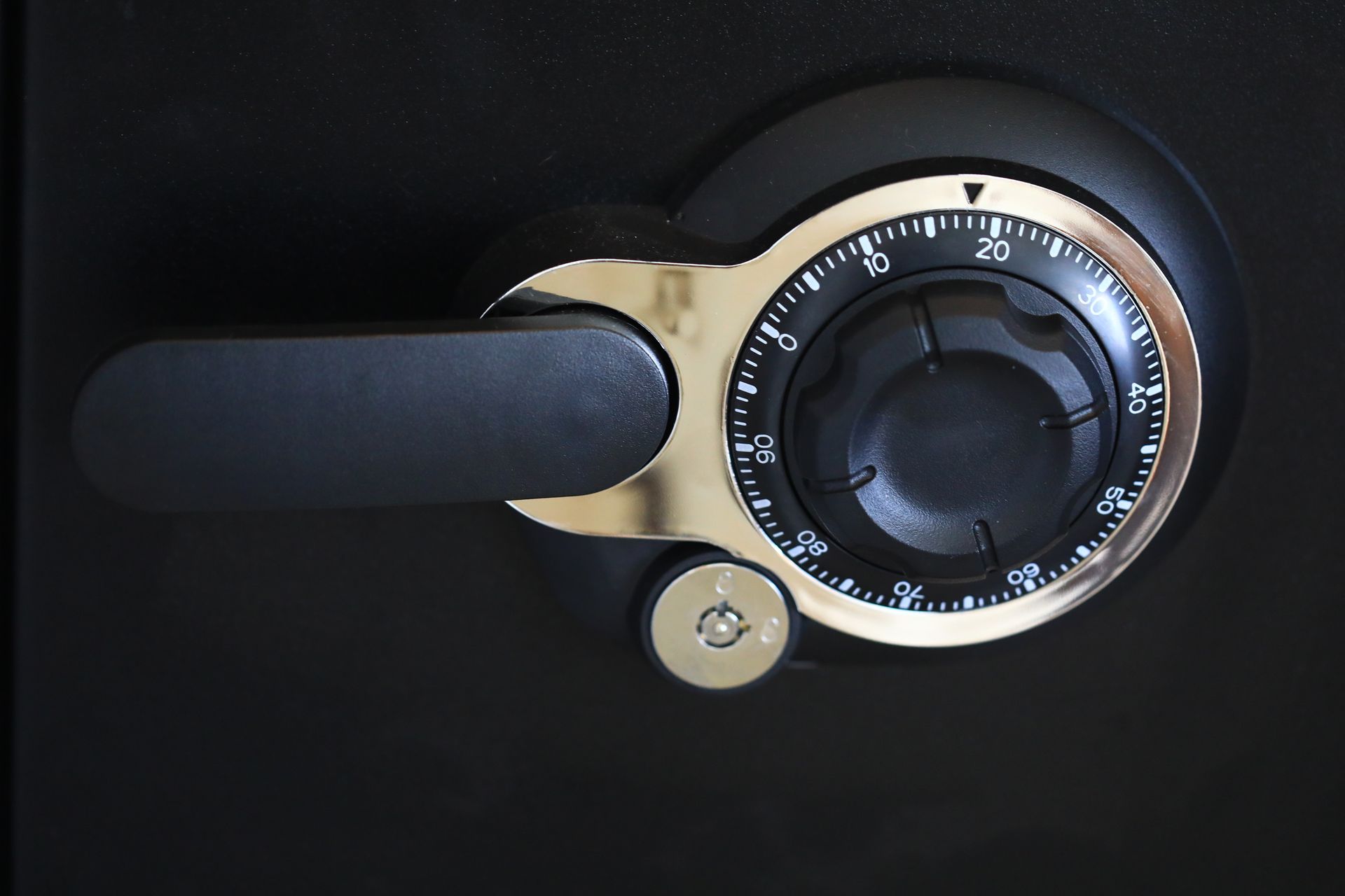 View of a combination dial of a personal safe zoomed in. View of a combination dial of a personal safe zoomed in.