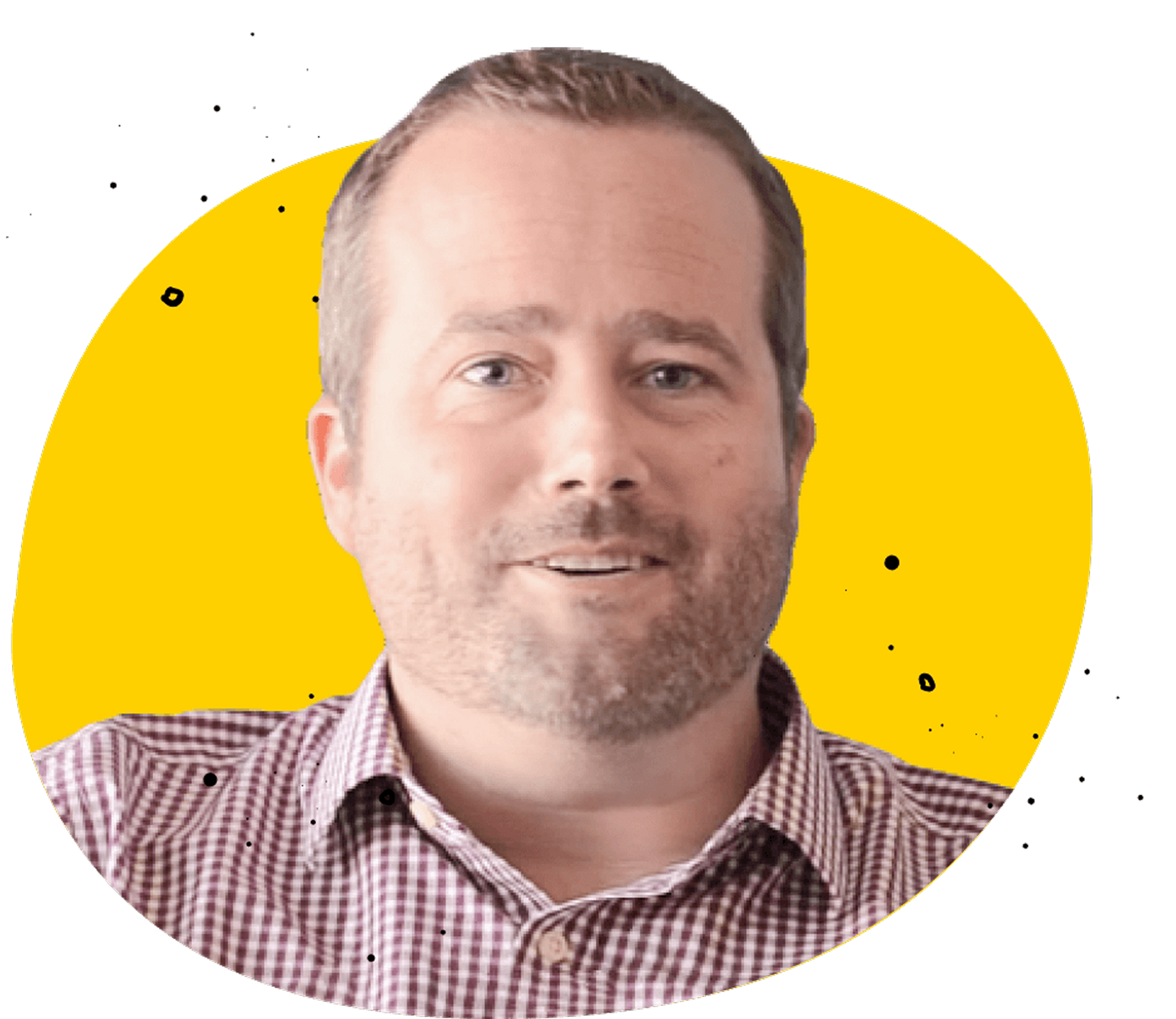 A man with short brown hair and a beard, wearing a plaid shirt, centered against a solid yellow circular background.