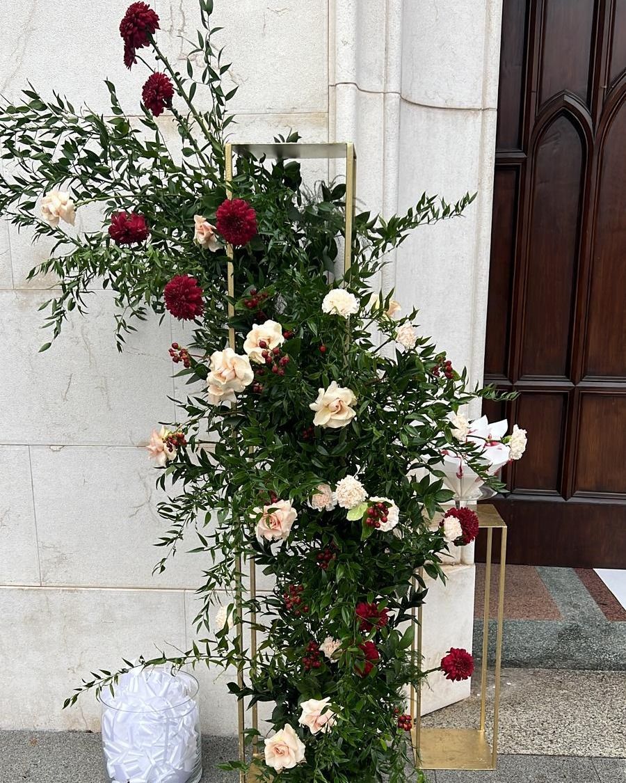 bouquet of flower in front of a door