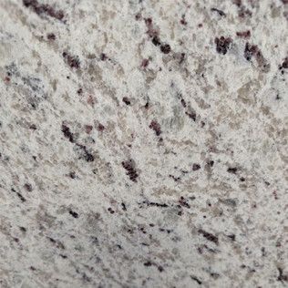 Close-up of speckled light gray granite with dark flecks