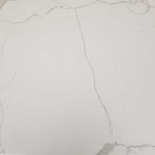 Close-up of a light gray marble surface with thin dark cracks.