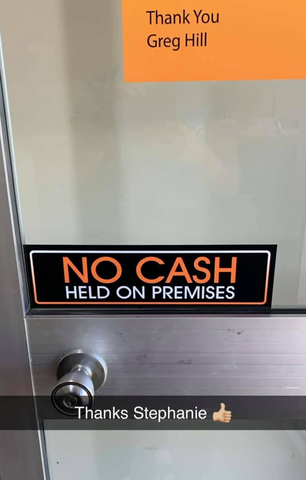 A Door With a No Cash Held on Premises Sign on It — Signtek Gladstone in Gladstone Central, QLD