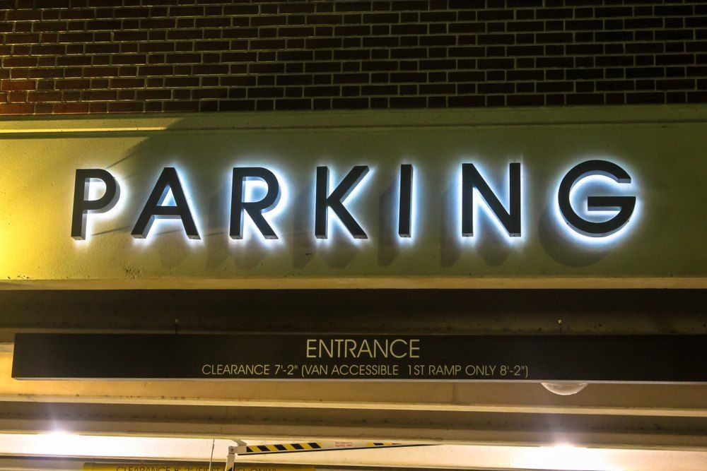 A Parking Sign That is Lit Up at Night — Signtek Gladstone in Gladstone Central, QLD