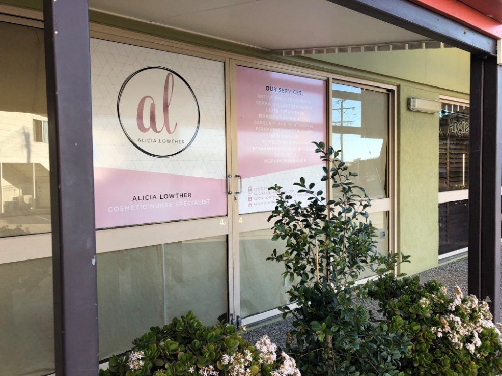 A Building With a Sign on the Door — Signtek Gladstone in Gladstone Central, QLD
