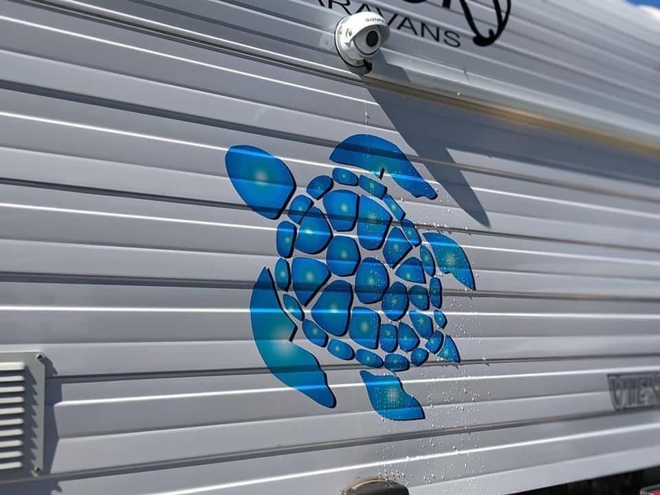 A Turtle is Painted on the Side of a Trailer — Signtek Gladstone in Gladstone Central, QLD