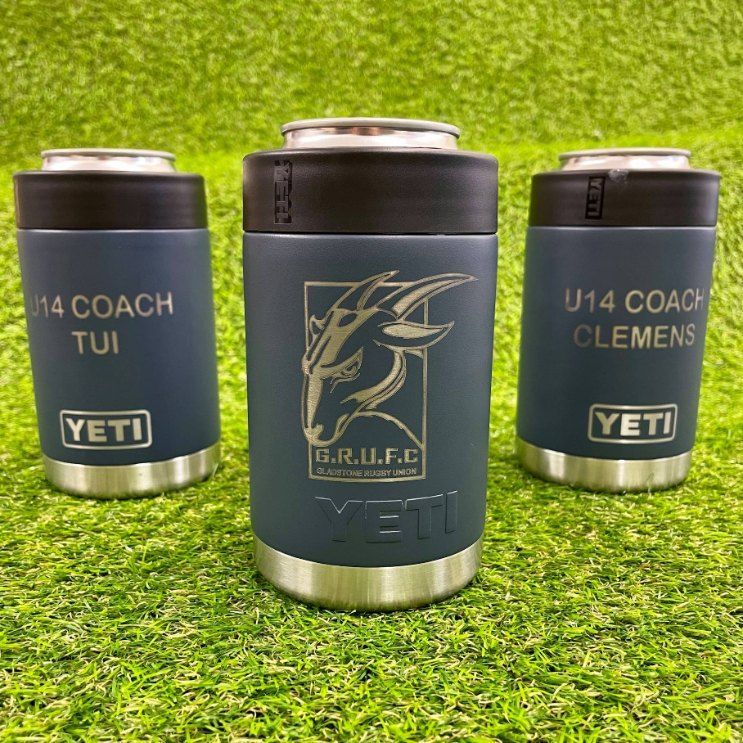 Three Yeti Can Holders Are Sitting on Top of a Lush Green Field — Signtek Gladstone in Gladstone Central, QLD