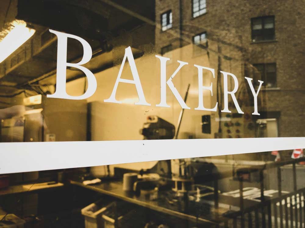 Bakery Letter On Shop Window — Expert Signwriters in Gladstone Central, QLD