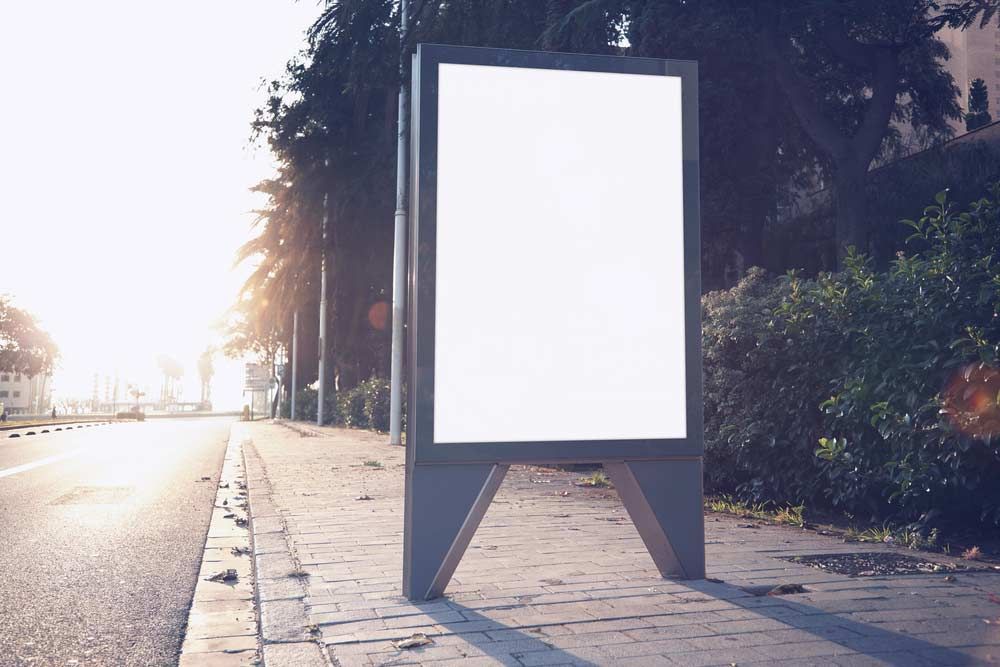 A Blank Billboard is Sitting on the Side of the Road — Signtek Gladstone in Gladstone Central, QLD