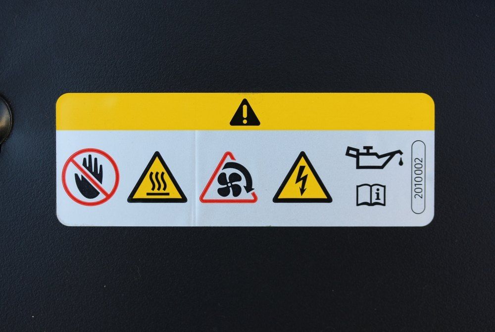 Warning Label With Multiple Symbols on a Yellow Background — Signtek Gladstone in Gladstone Central, QLD