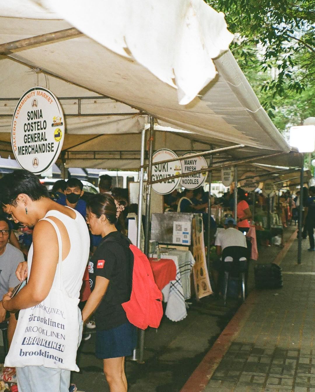 Busy Salcedo Community Market stalls in Makati with local vendors