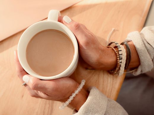 Danica Holding a Cup of Coffee