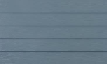 Light gray horizontal wood siding with subtle texture and seams