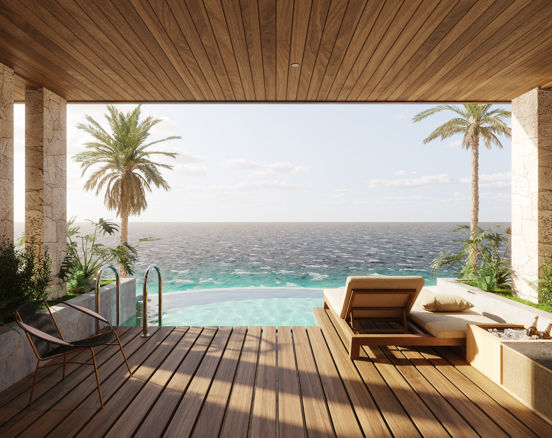 Wooden patio overlooking an ocean and infinity pool. Lounge chair, palm trees, and sunny sky.
