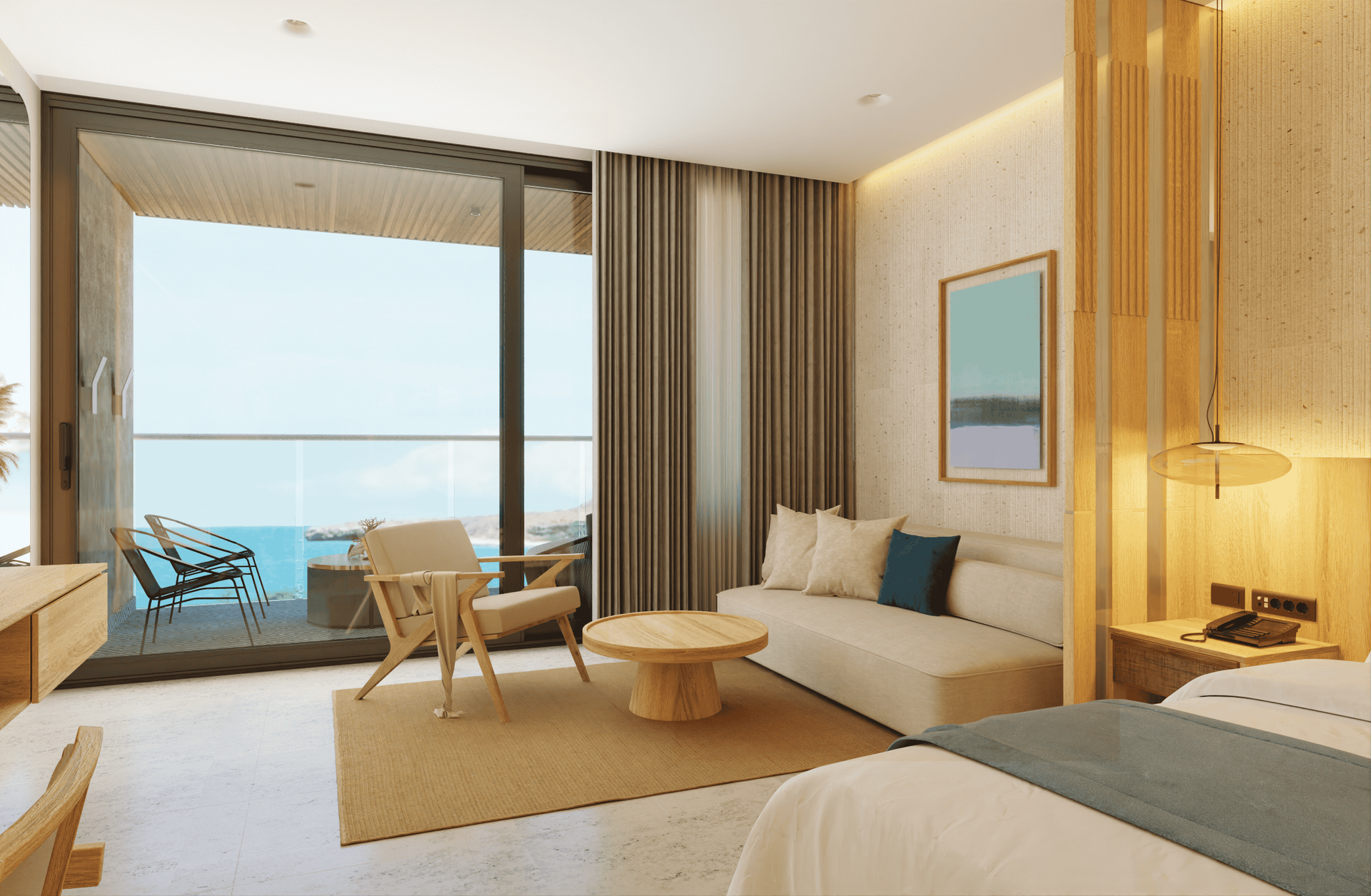 Modern hotel room with ocean view, featuring a couch, chair, bed, and a balcony.