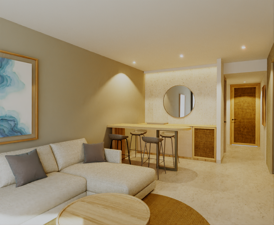 Beige living room with couch, bar with stools, round mirror, and hallway.