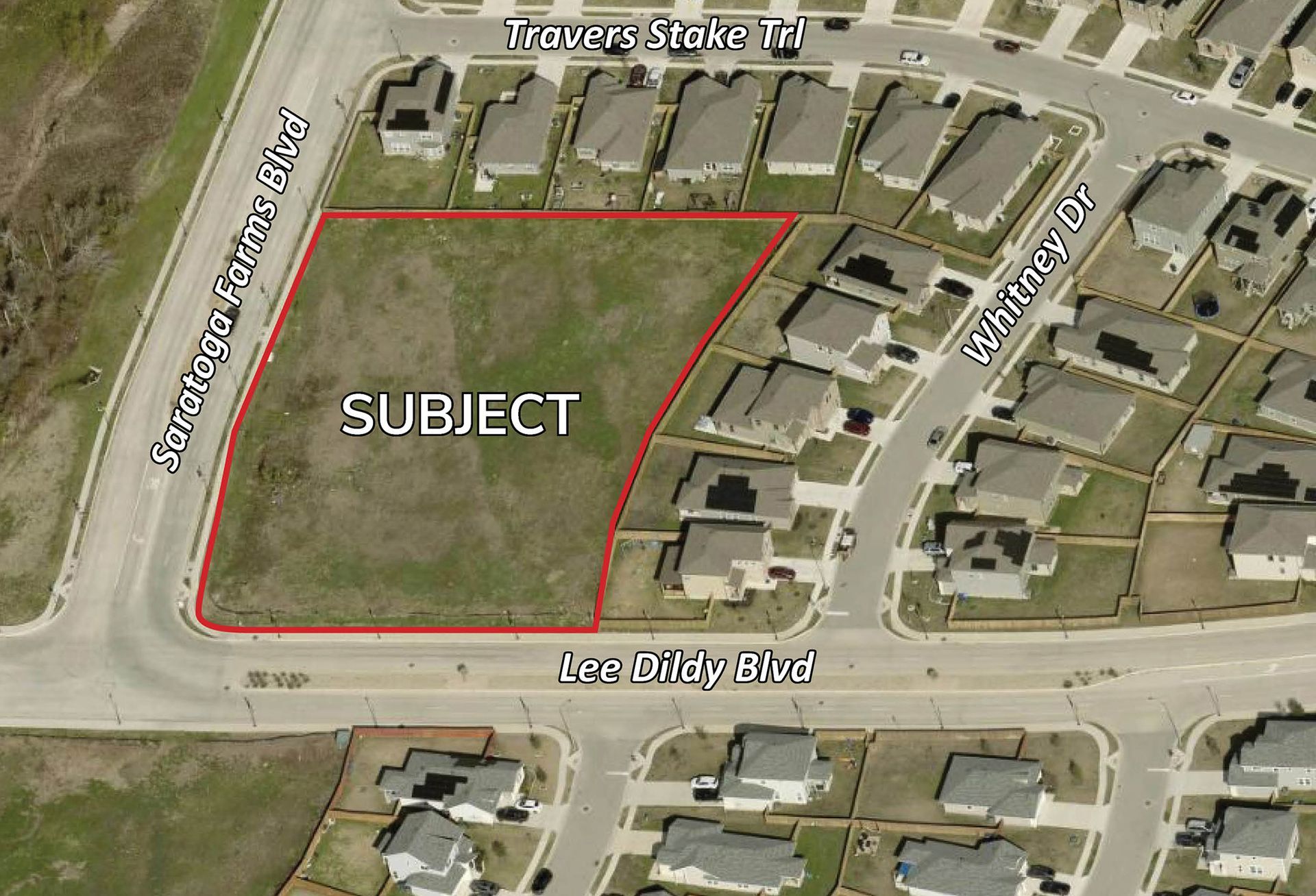 An aerial view of a residential area with a red outline of the subject