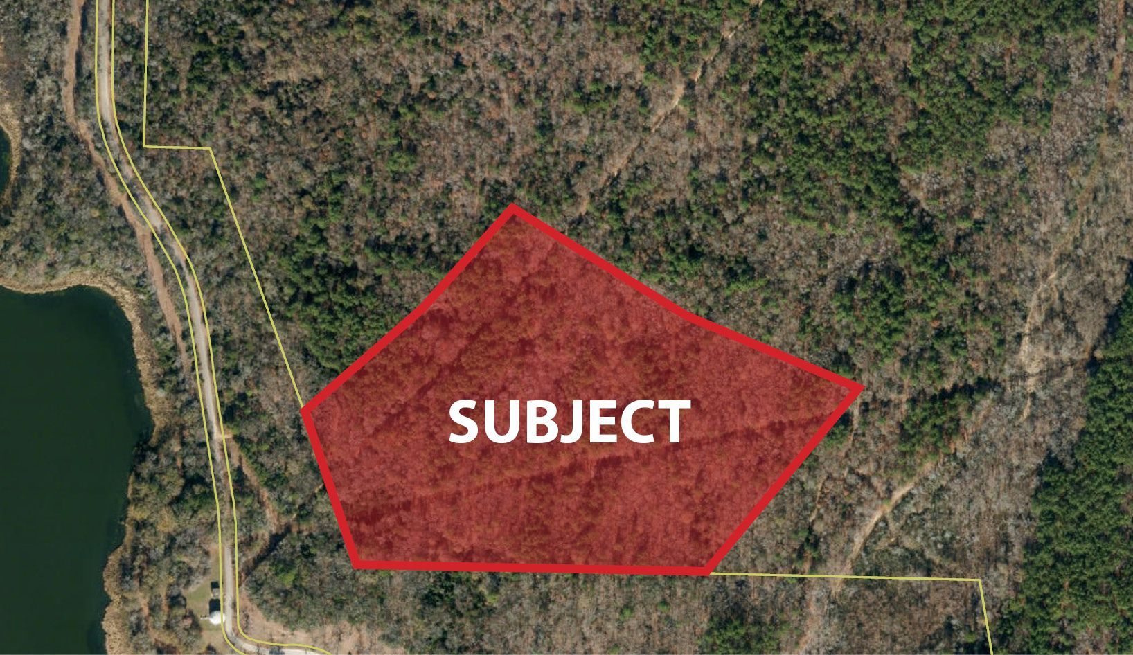 Aerial view of a wooded area, labeled 