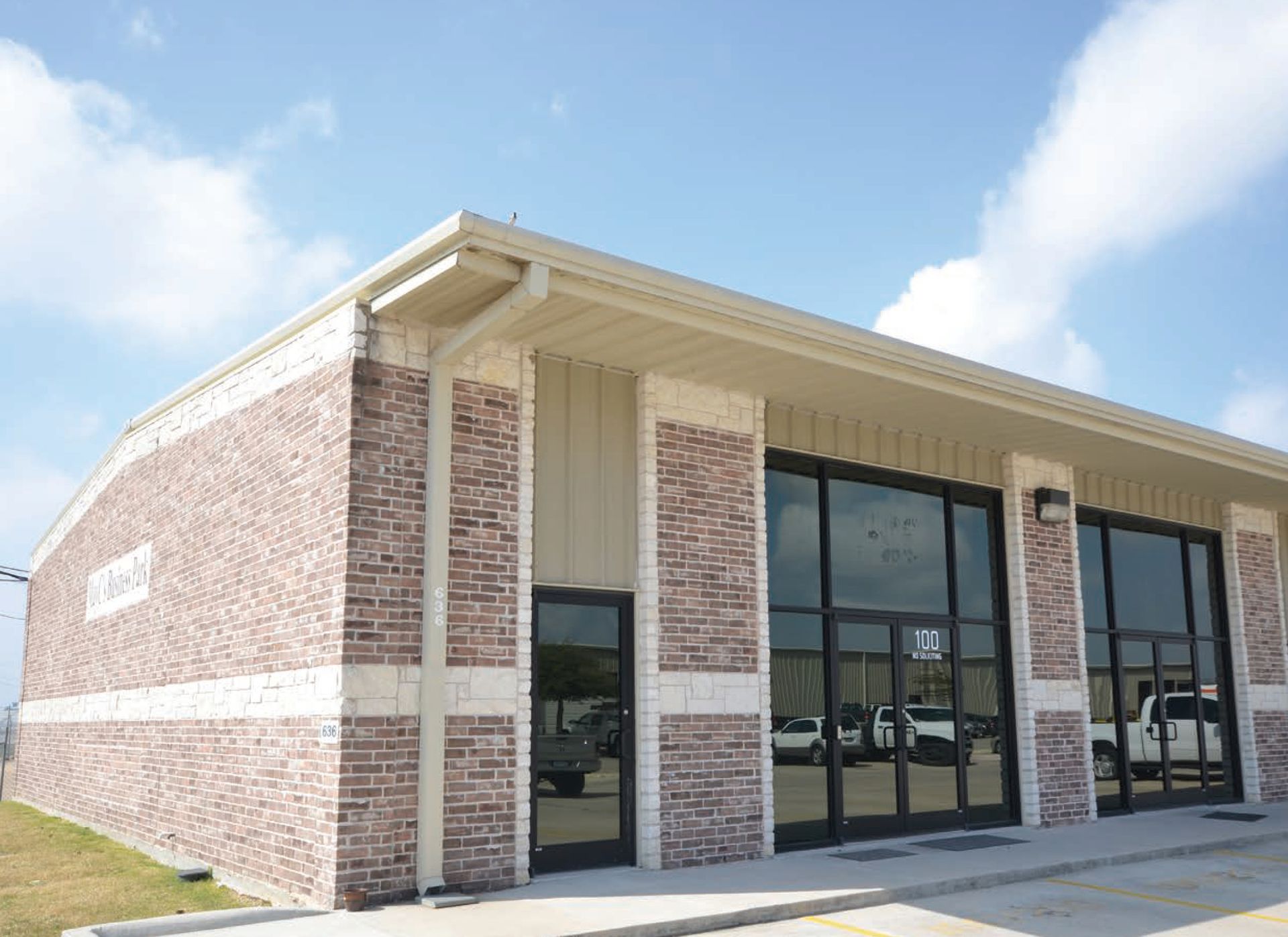 A large brick building with a lot of windows