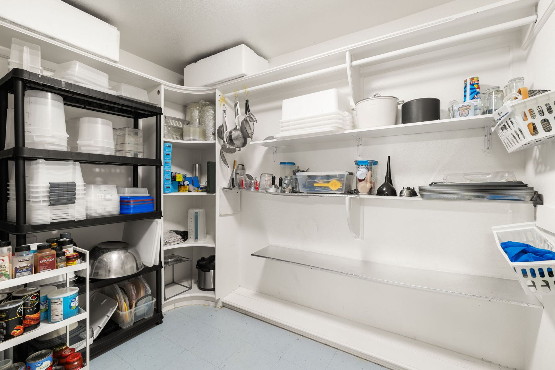 608 N Church St commercial kitchen with stainless steel prep tables, food processing equipment, and wash station