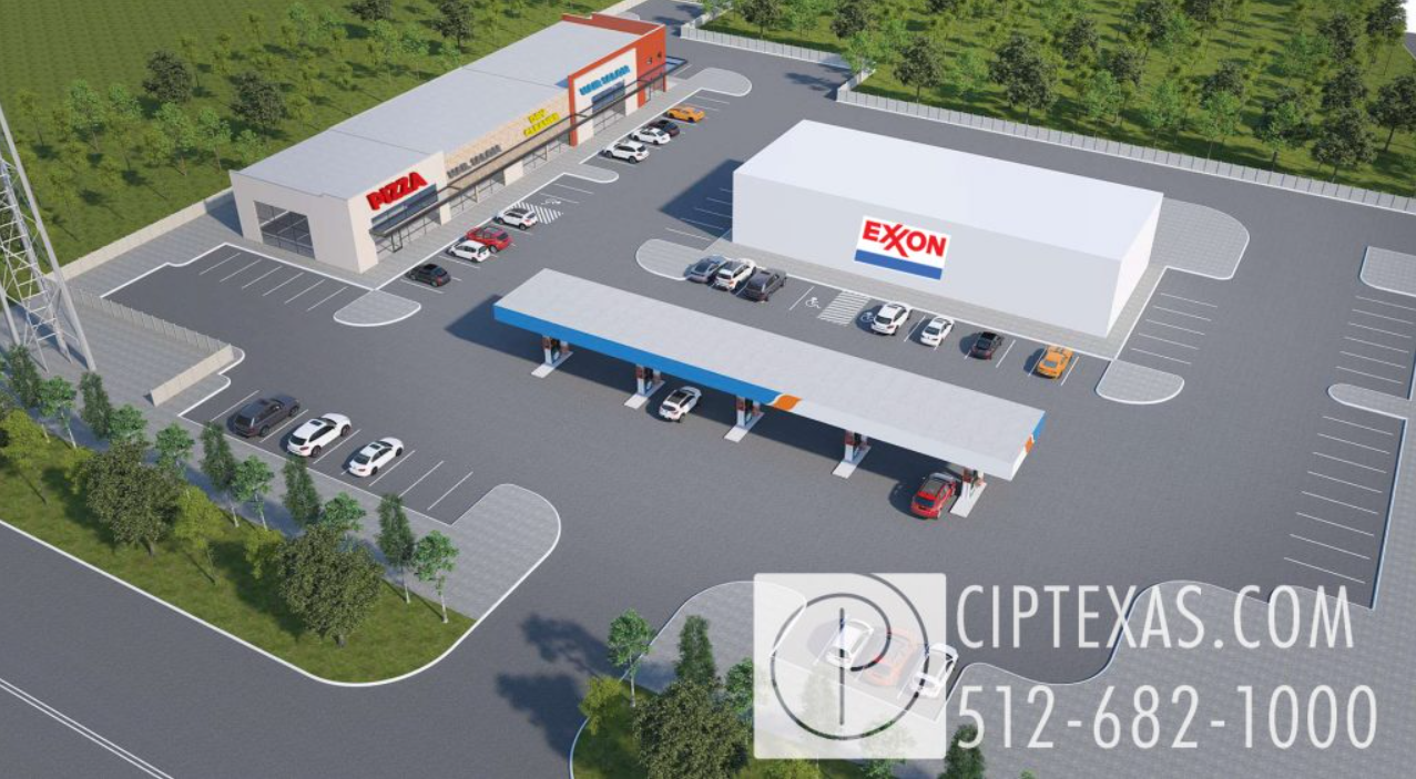 an aerial view of a gas station with an exxon sign