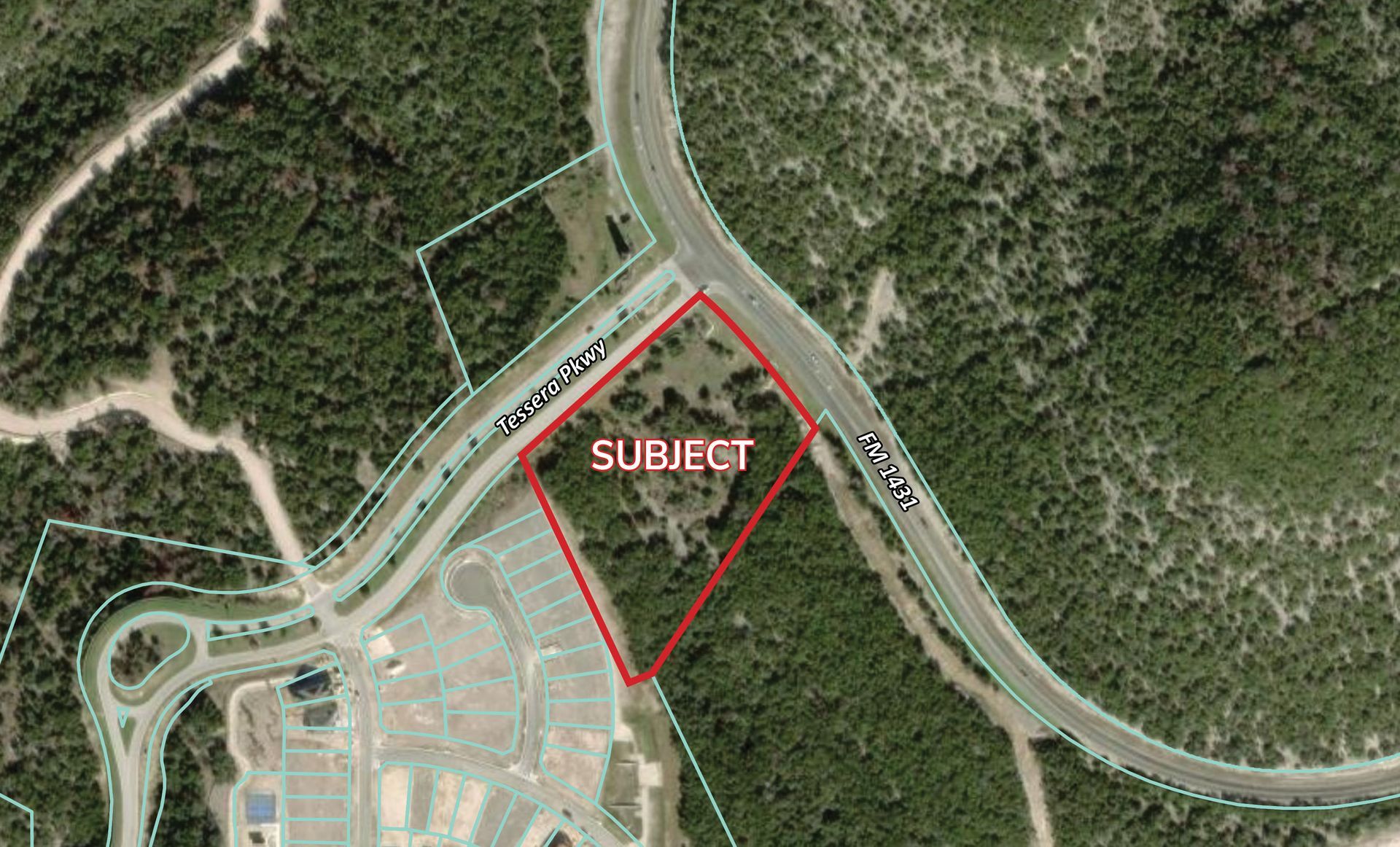 An aerial view of a residential area with a red triangle in the middle.