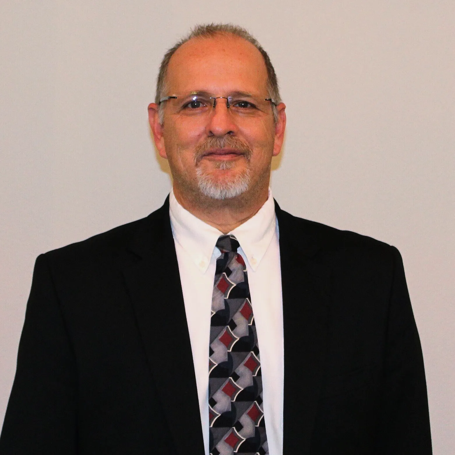 ROBERT J. ORTIZ