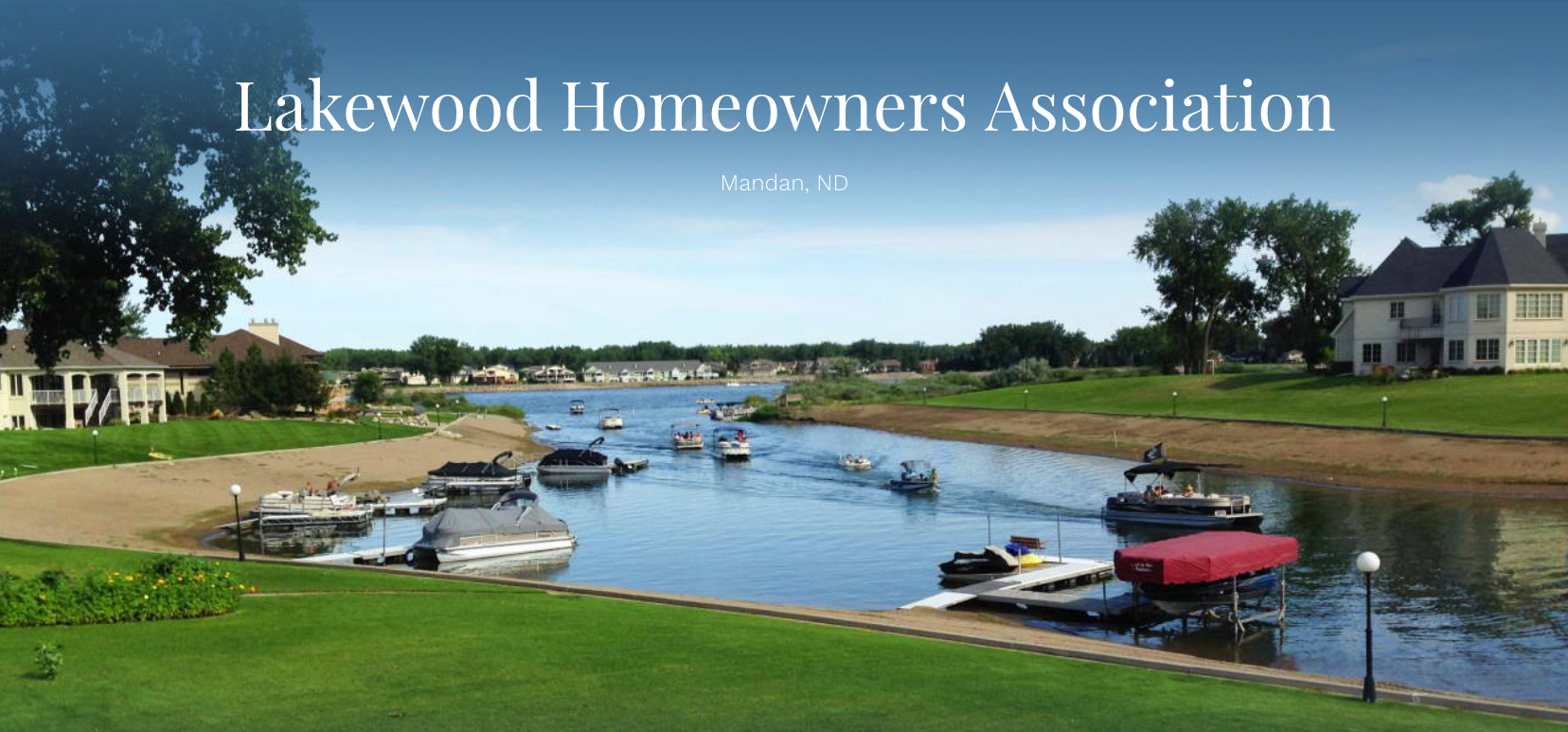A picture of a lake with the words lakewood homeowners association