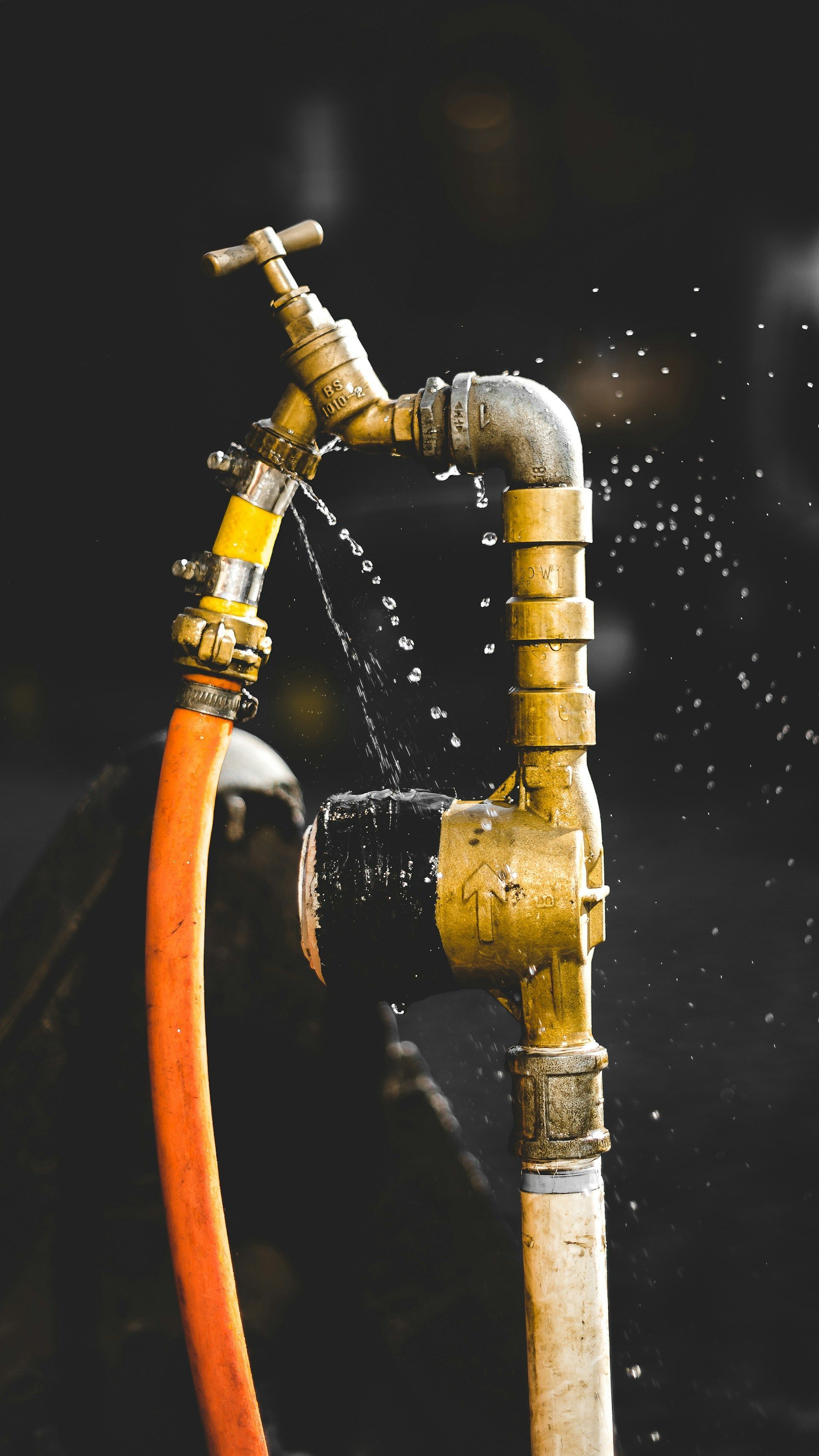 Dirty, Stained White Sink With Water Running, Razors, and a Knife — Sunset Plumbing NT in Moil, NT
