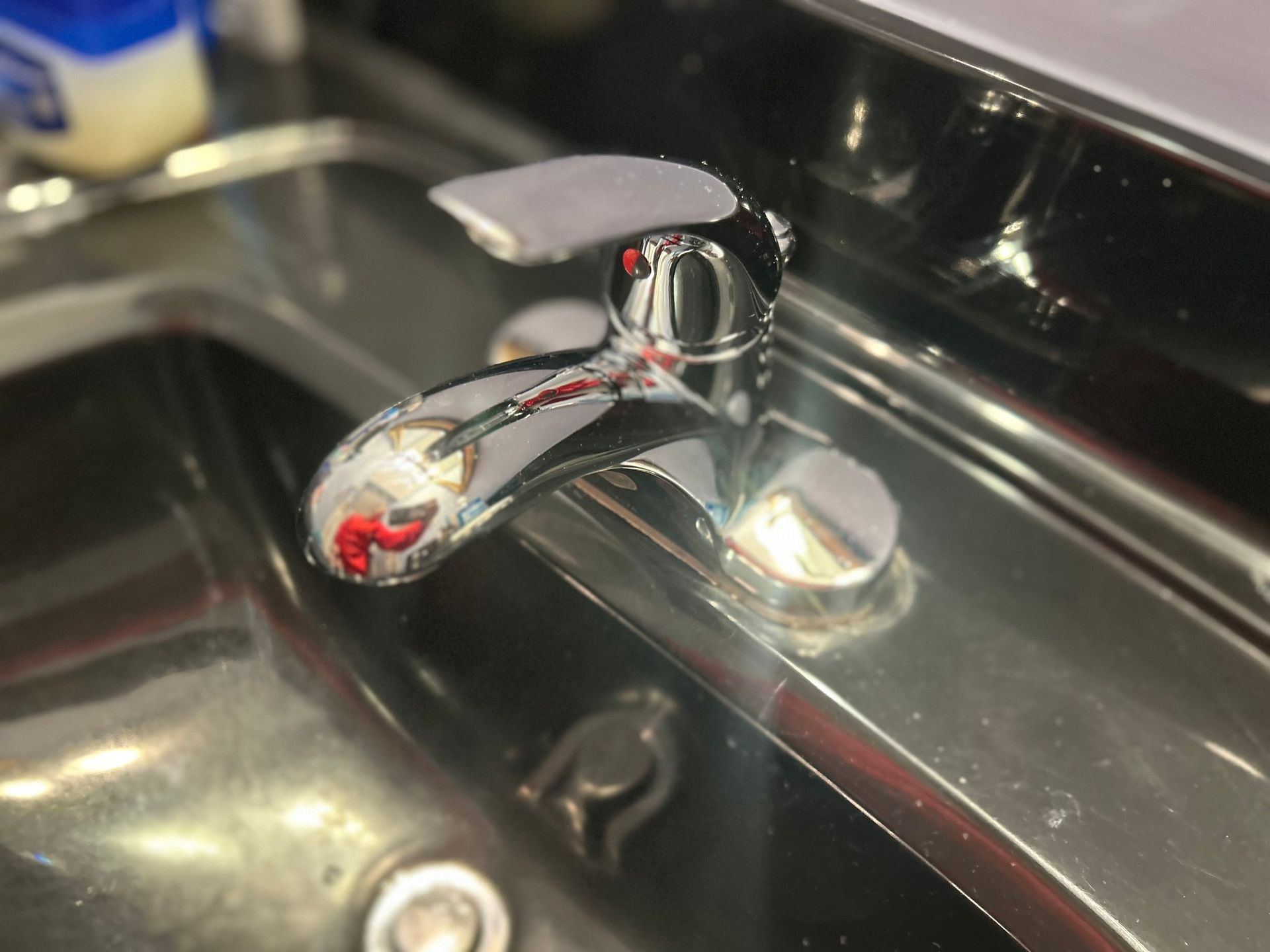 A close up of a bathroom sink with a faucet