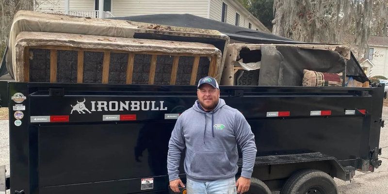 Trash Masters crew completing a junk removal project in Summerville, SC