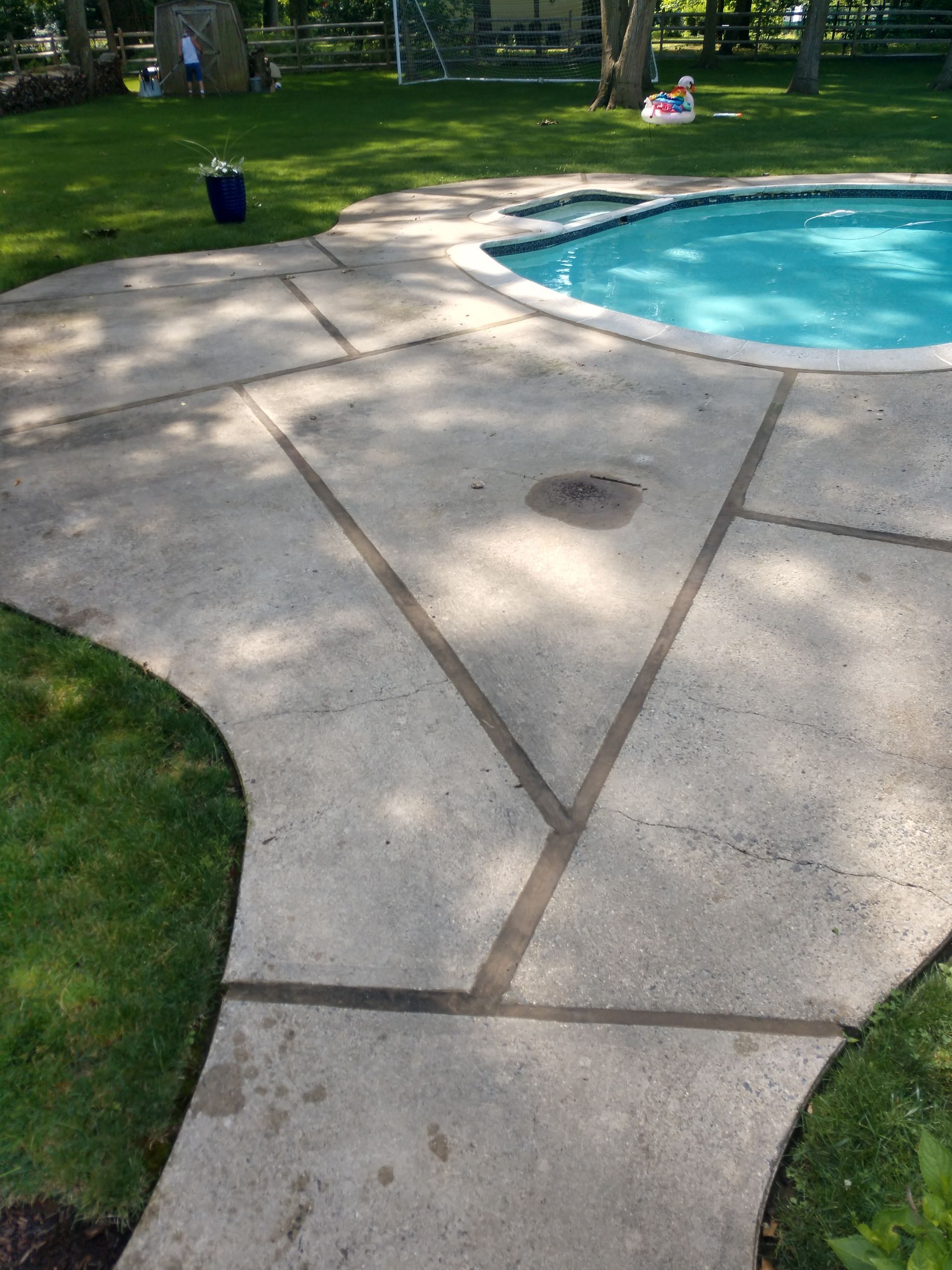 Powerwashing Concrete Pool Area in Monmouth County NJ-Before