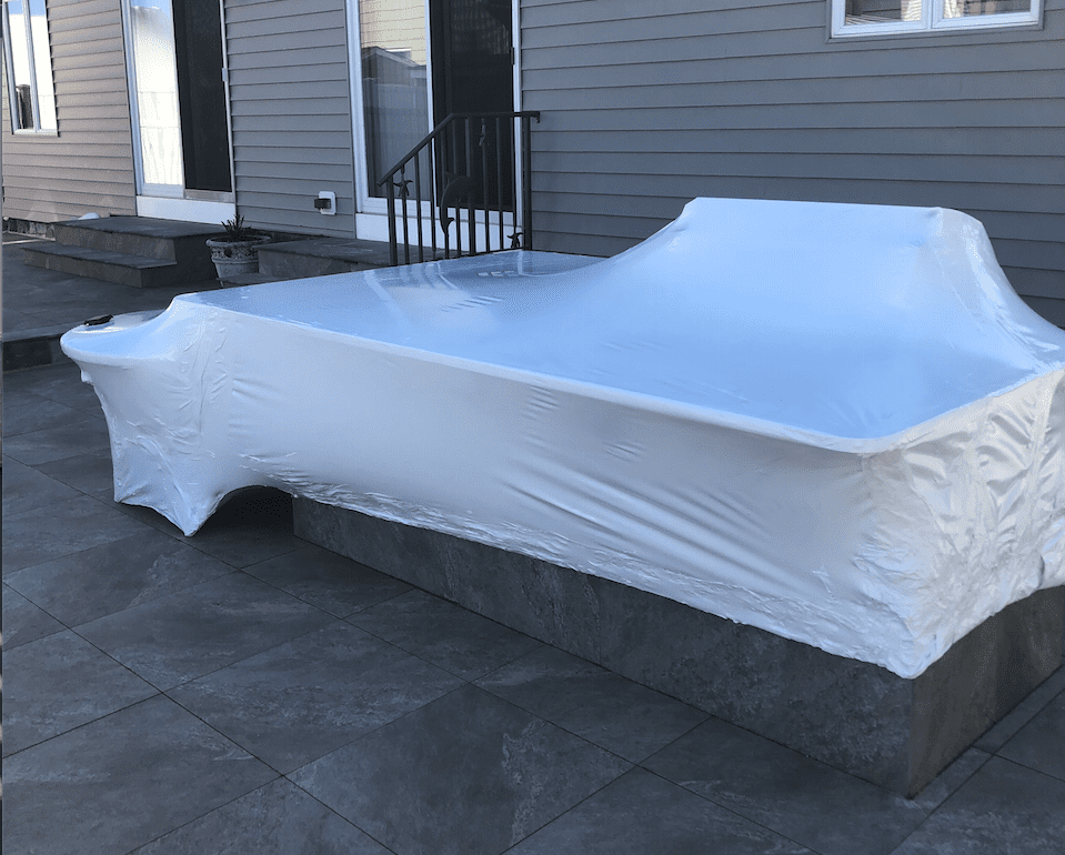 An outdoor kitchen shrink wrapped.