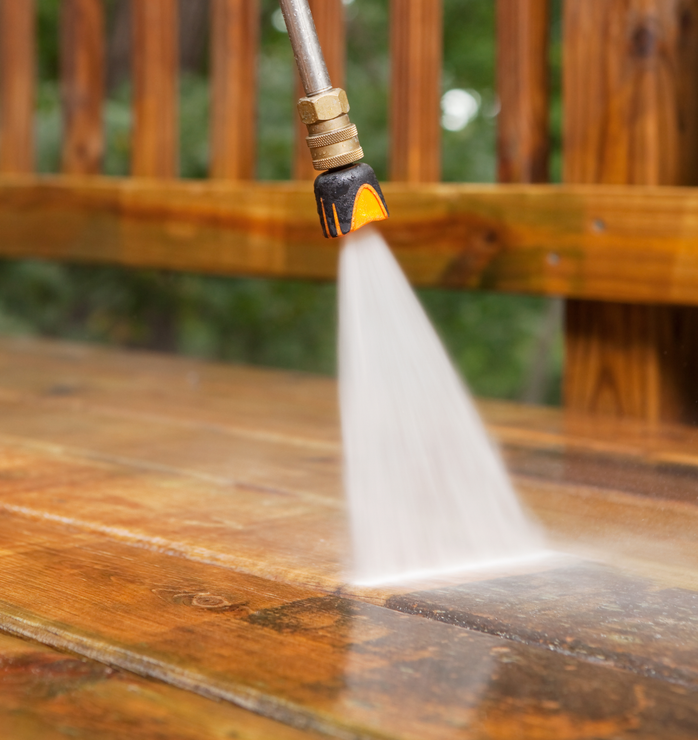 A deck being cleaned with a power washer in Freehold, NJ A deck being cleaned with a power washer in Freehold, NJ