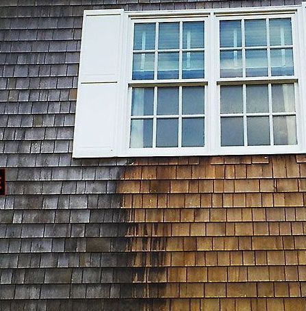 A house with wooden siding before & after soft washing.