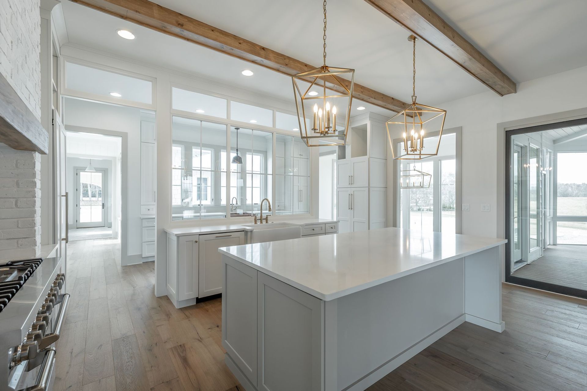 There is a large island in the middle of the kitchen.