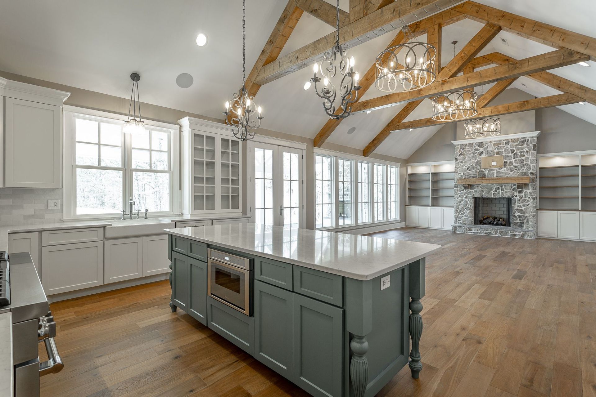 There is a large island in the middle of the kitchen.