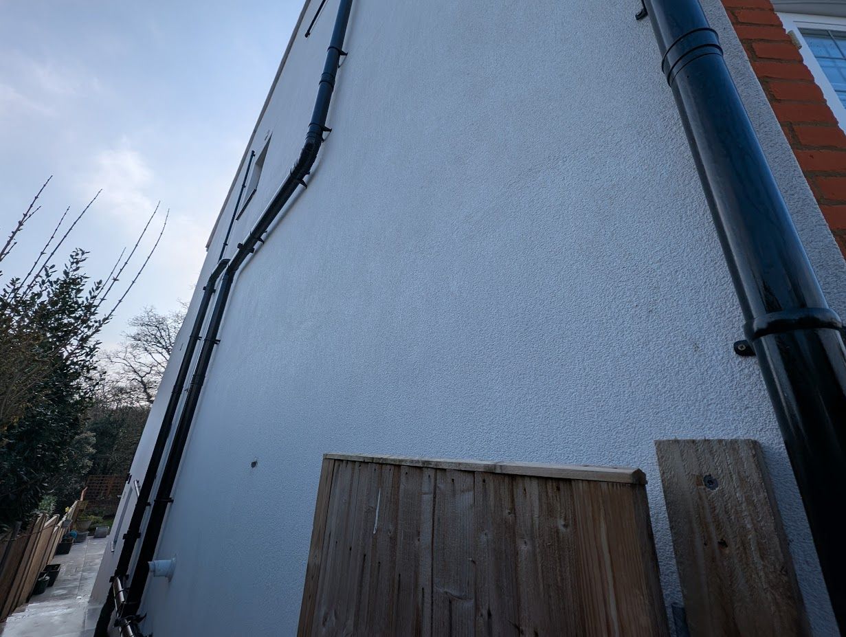 Render wall after softwash cleaning
