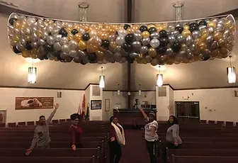 Creating Balloons Inside Stadium — Granger, IN — Make 'Em Pop Creations