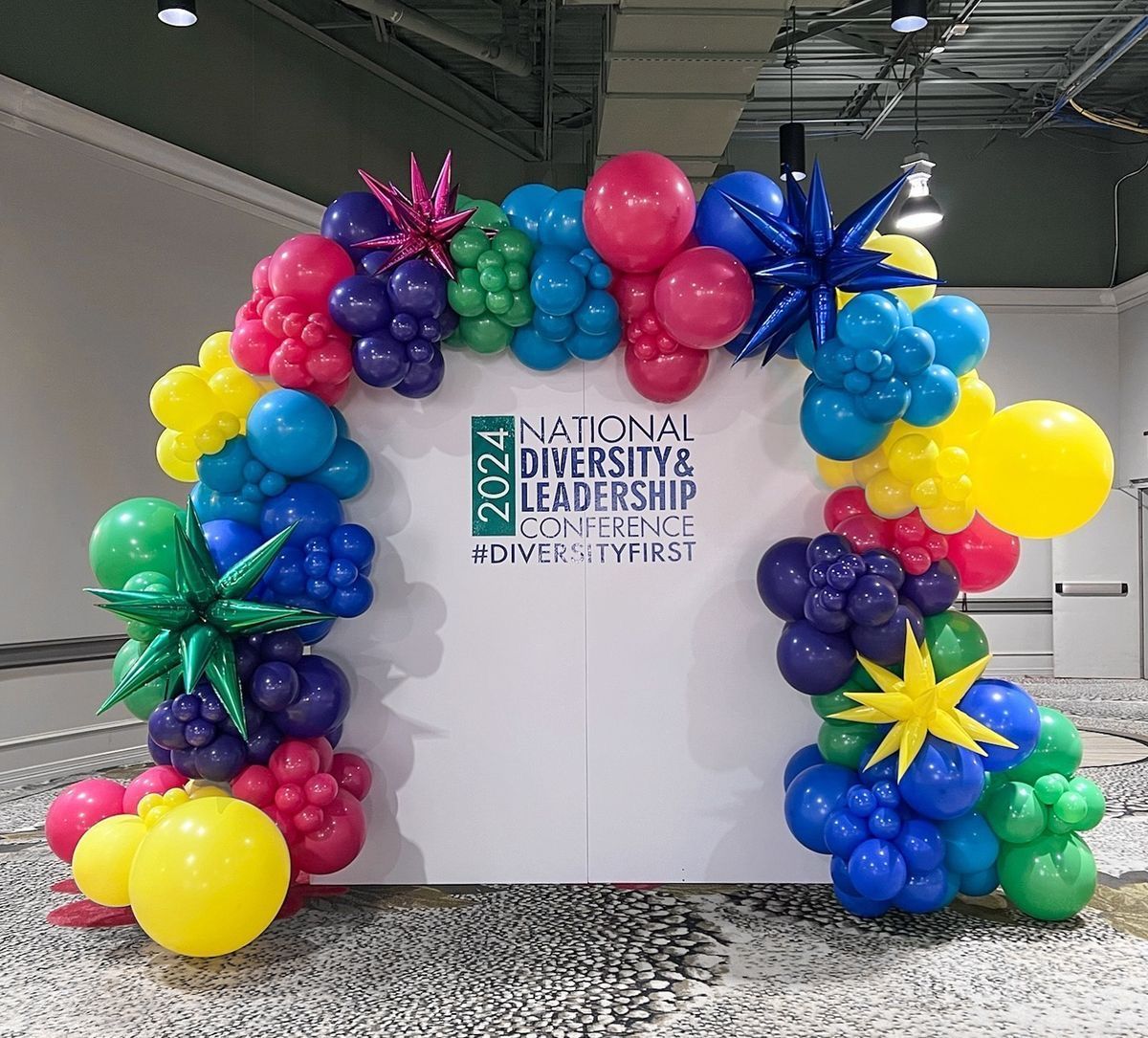 A colorful balloon arch for the national diversity and leadership conference