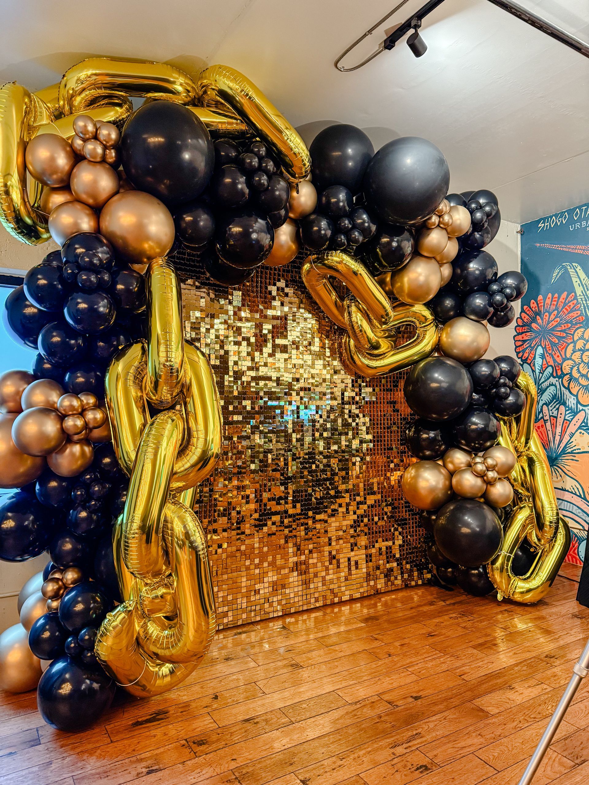 A room filled with balloons and smoke coming out of it.
