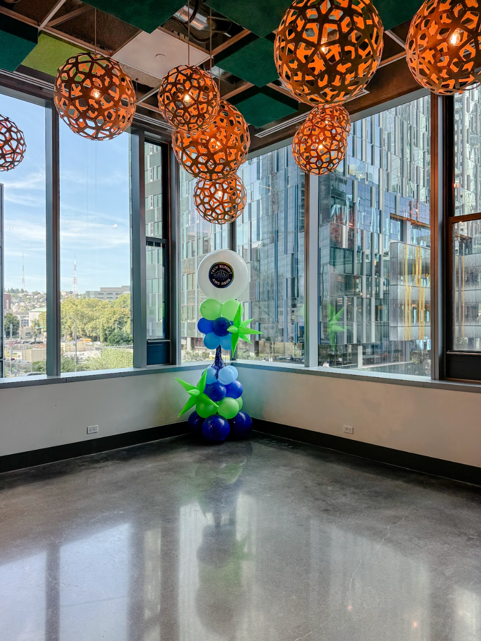 A display for nivea and coppertone with blue and white balloons