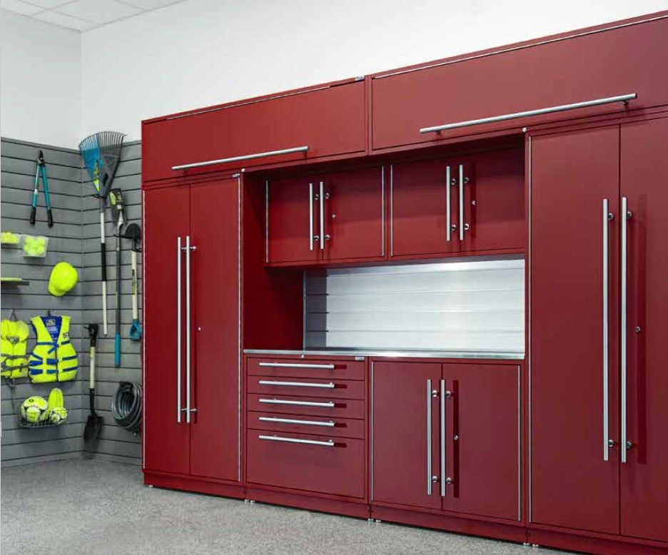 Bold red Proslat LUX cabinets with integrated wall storage for tools and gear. A clean, efficient garage organization solution by Global Garage Flooring & Design.