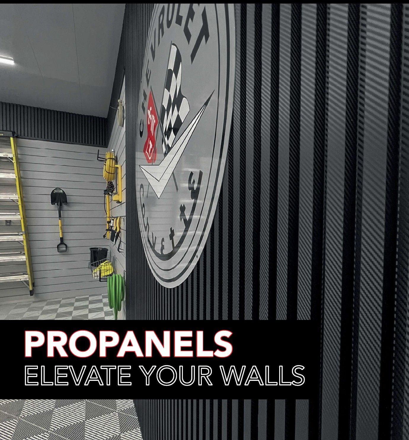 High‑end carbon‑fiber style wall panels with integrated tool storage and a Corvette emblem, designed to enhance premium garage environments.