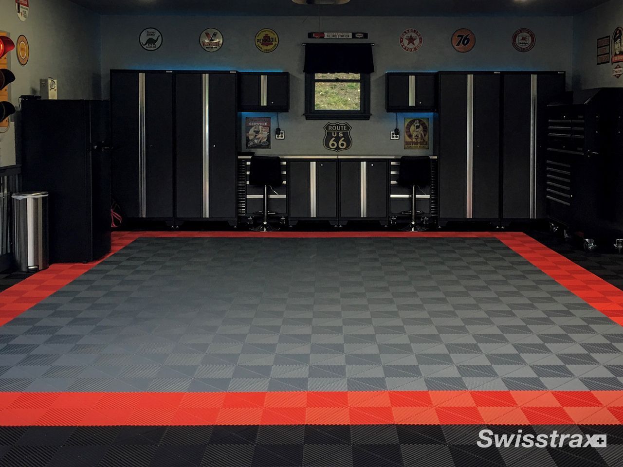 Look at a fully equipped home workshop and tool station in garage highlighted by a clean, seamless red, grey and black checkered SwissTrax interlocking floor.