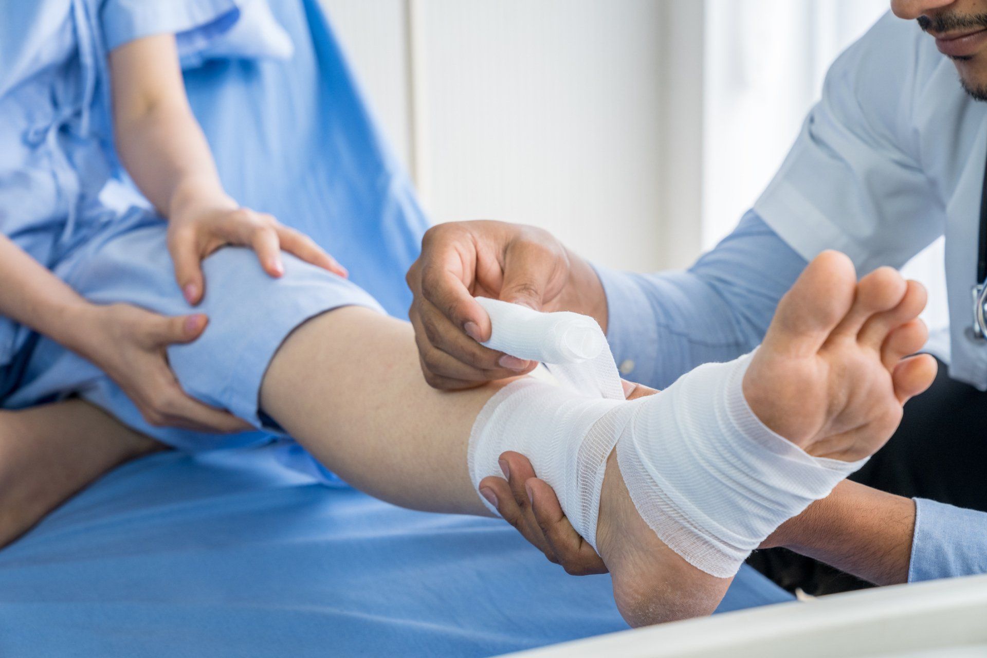 Bandaging Upper Limb of Patient — Norwich, CT — CT Podiatry & Foot Surgery