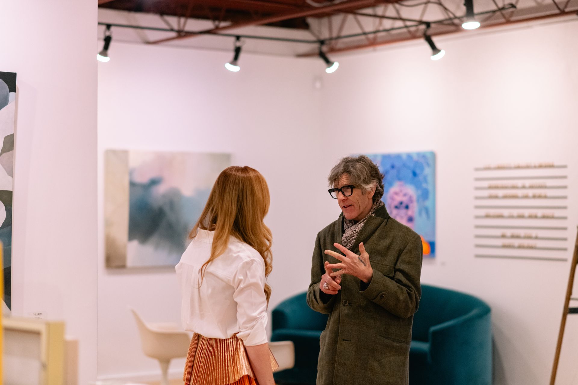 Liz chatting with guest