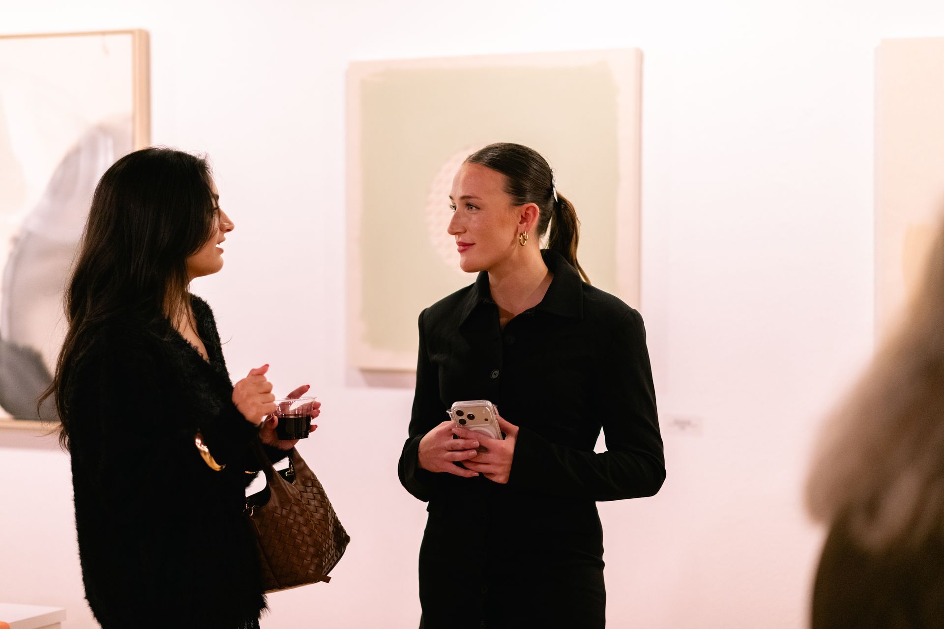 Lauren chatting amongst guests
