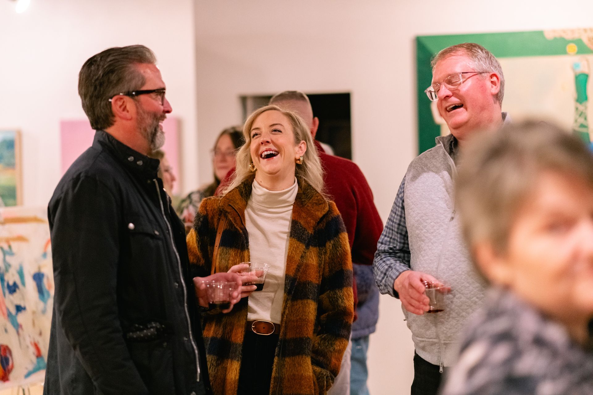 Guests laughing amongst one another